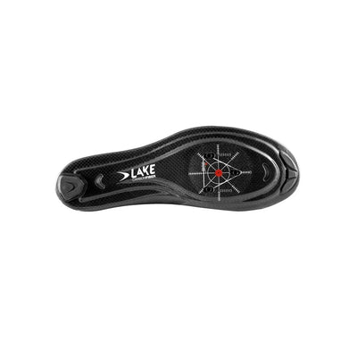 Detailed view of the Lake CX239 100% carbon fibre sole at bicycle. Richmond, London, featuring the three-hole cleat pattern and ultra-stiff construction for elite road racing efficiency.